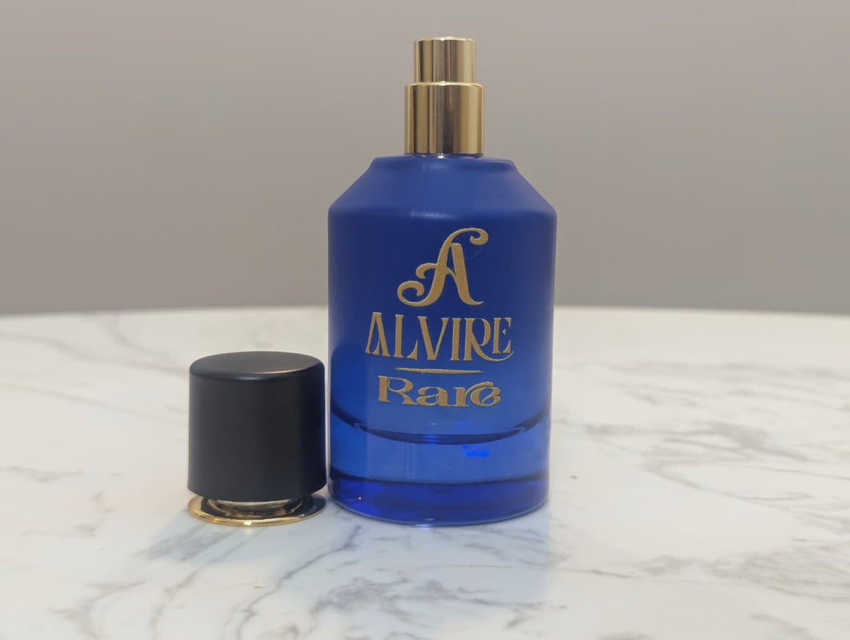 ALVIRE Rare perfume with the cap removed, showing the gold spray
