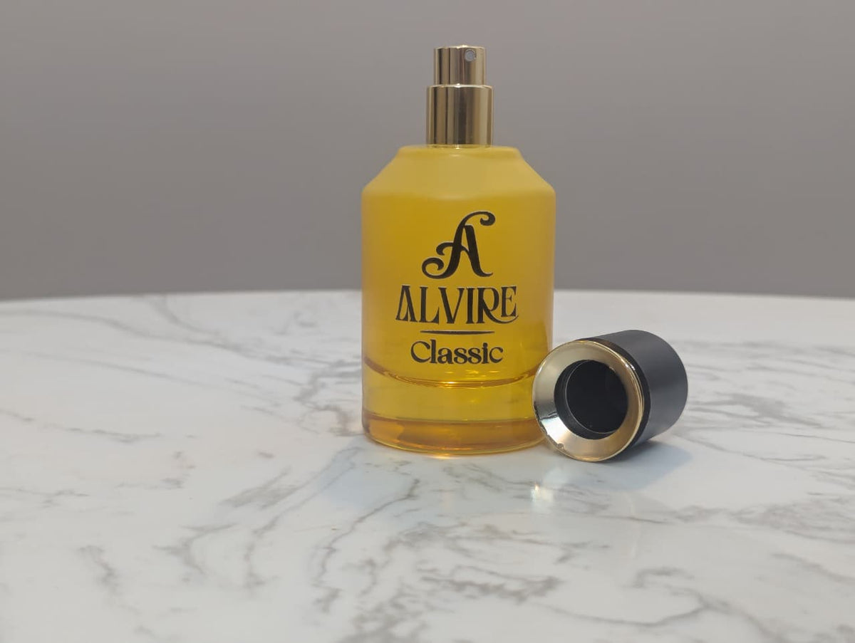 ALVIRE Classic perfume with the cap removed, showing the gold spray