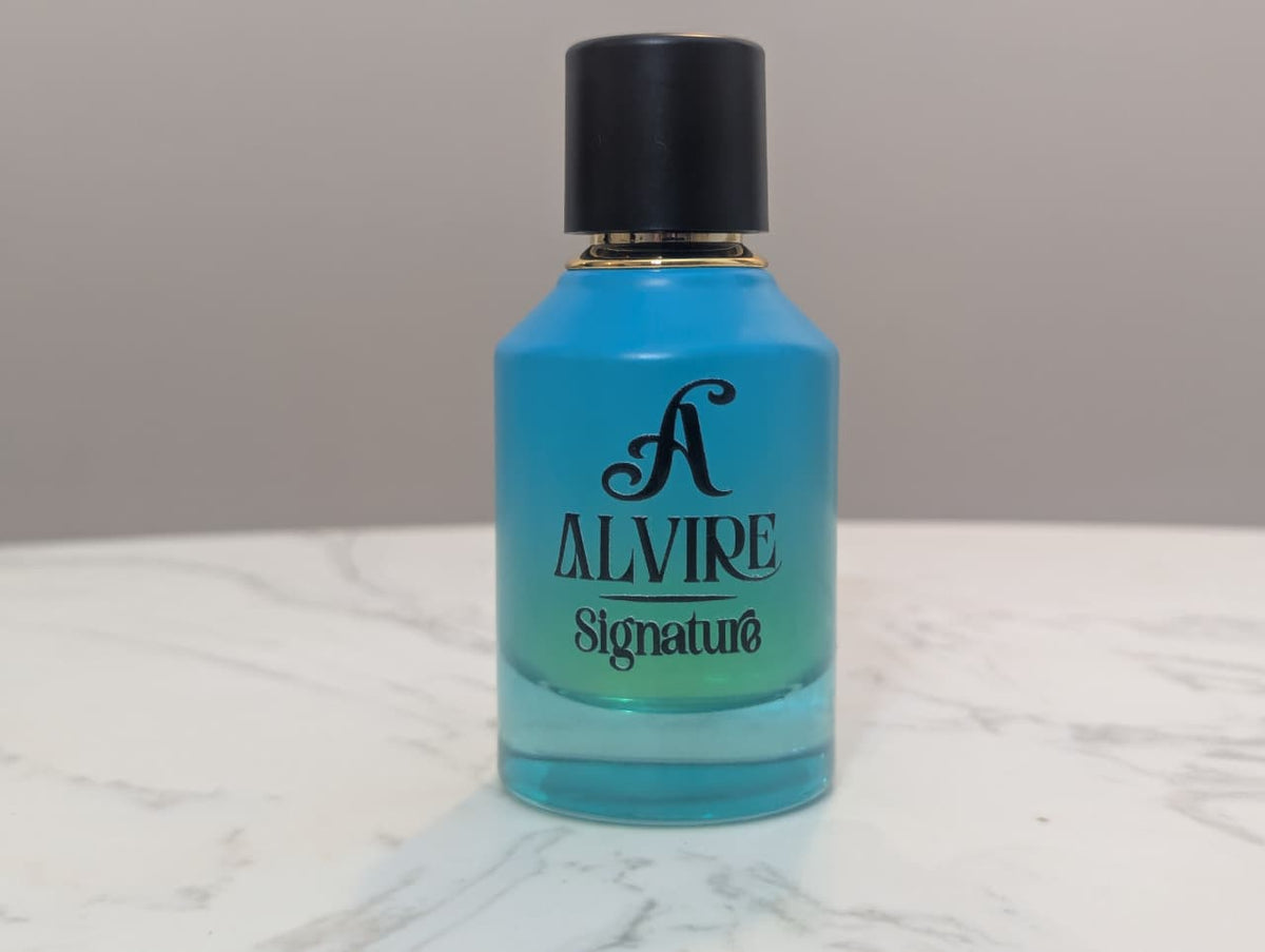 ALVIRE Signature 50 ml perfume bottle in turquoise glass on a marble table